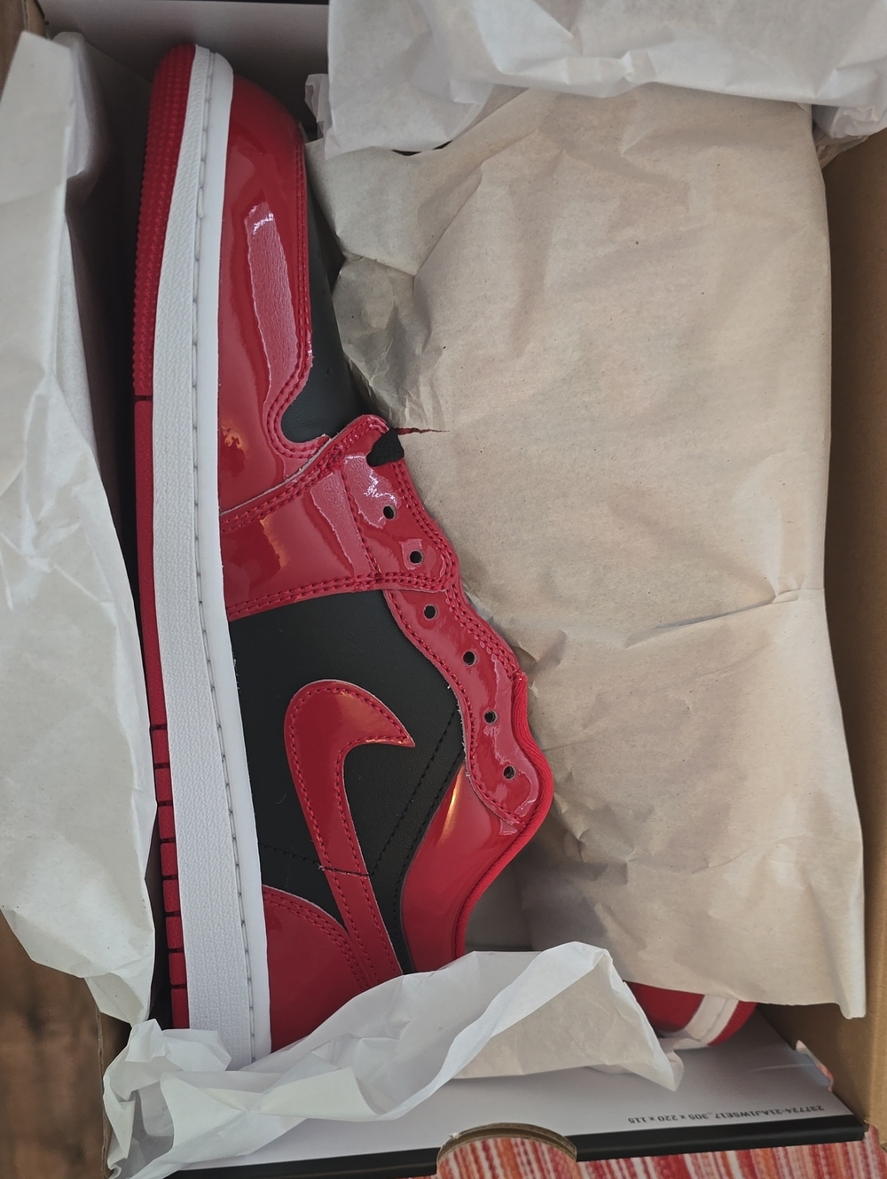 Jordan Red and Black Patent Leather High-Top Sneakers